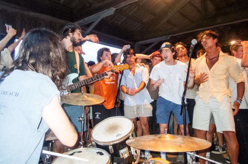 The young crowd is thrilled to see their friends play.