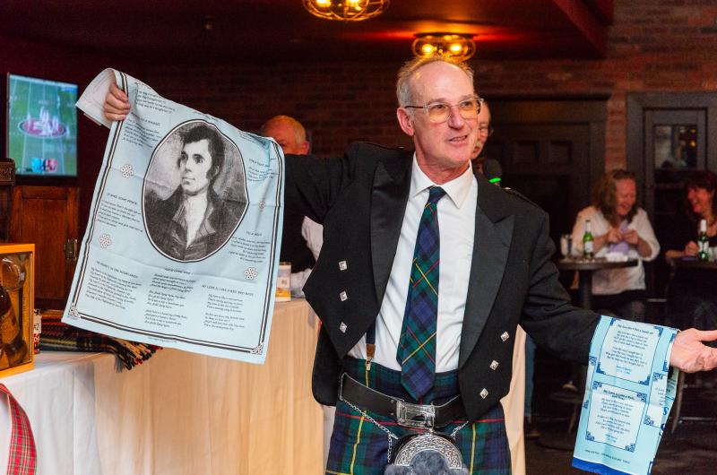 Colin Ewing with some Robert Burns tea towels.