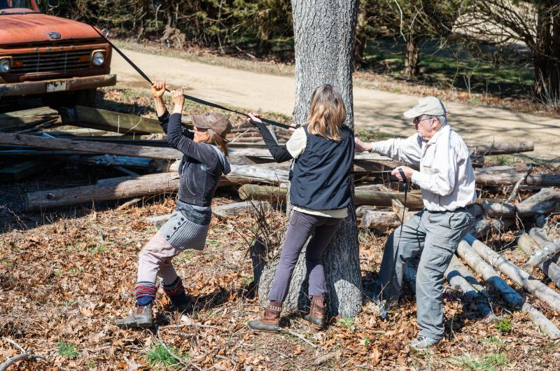 (left to right) Rebecca Sanders, Anna Greene, Bob Woodruff pulling the owl box into place.