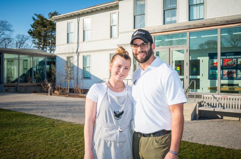 Aquila co-owners Jennifer Straub and Del Araujo in front of the museum.
