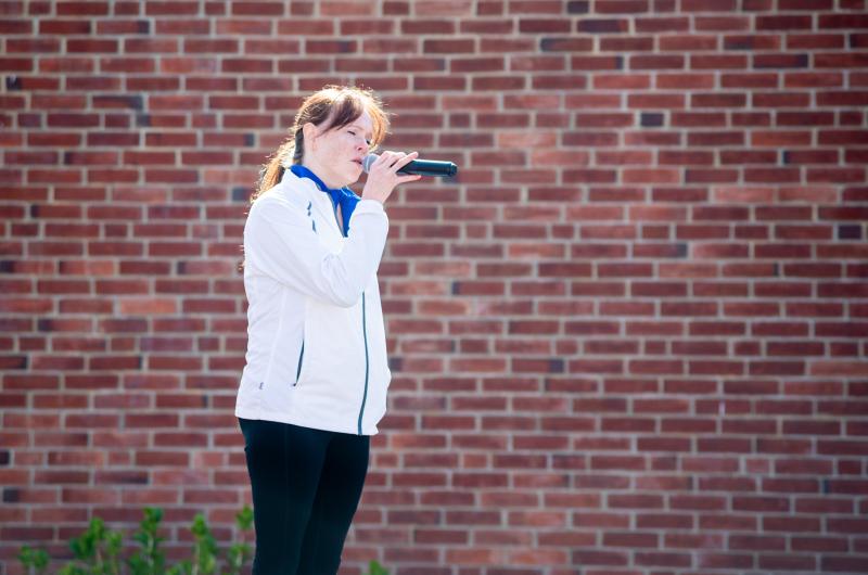 Caroline Brennan (Team Broken Spokes) singing the national anthem.
