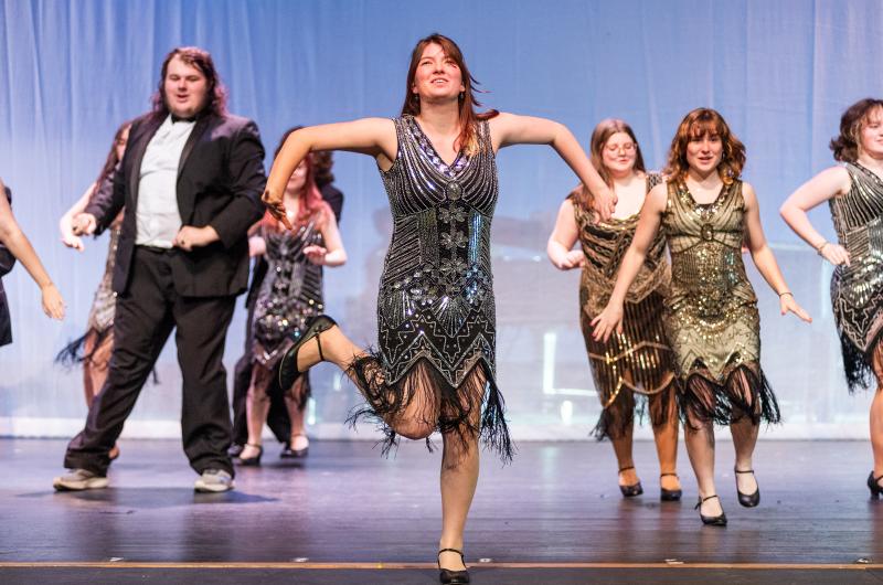 Emma Burt (center) doing The Charleston.