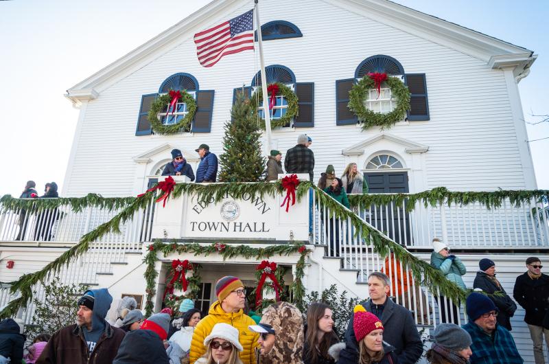 Parade viewers gather at Edgartown Town Hall.