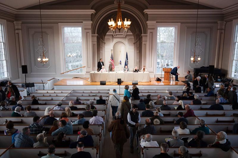 Edgartown voters filing in and filling the pews.