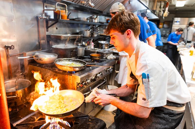 Ryan Scanlon at the stove.