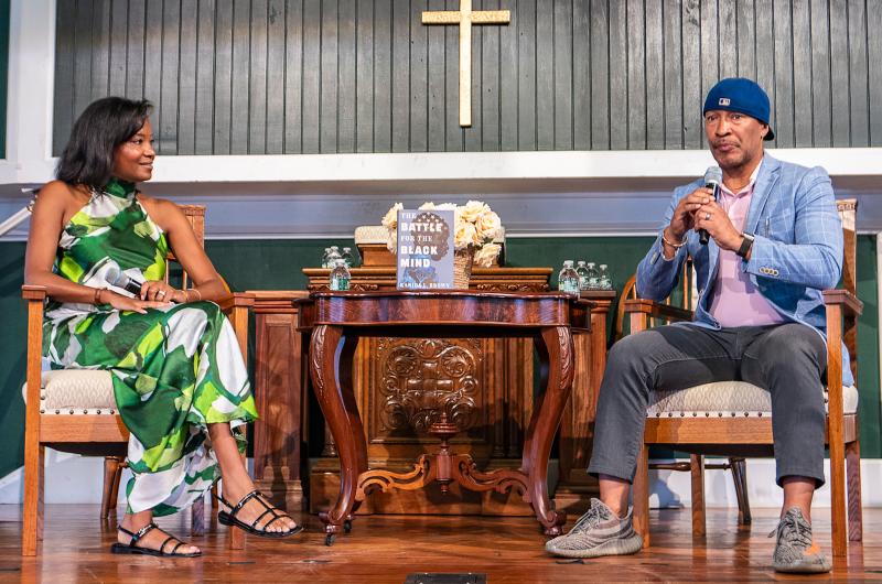 Karida Brown, left, talks about her book with Shane Evans.