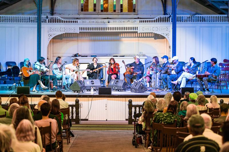 The lineup of musicians fills the Tabernacle stage.