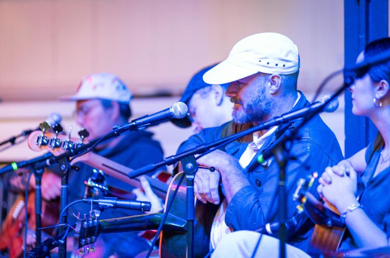 Colin Ruel watches as the song he wrote is performed.