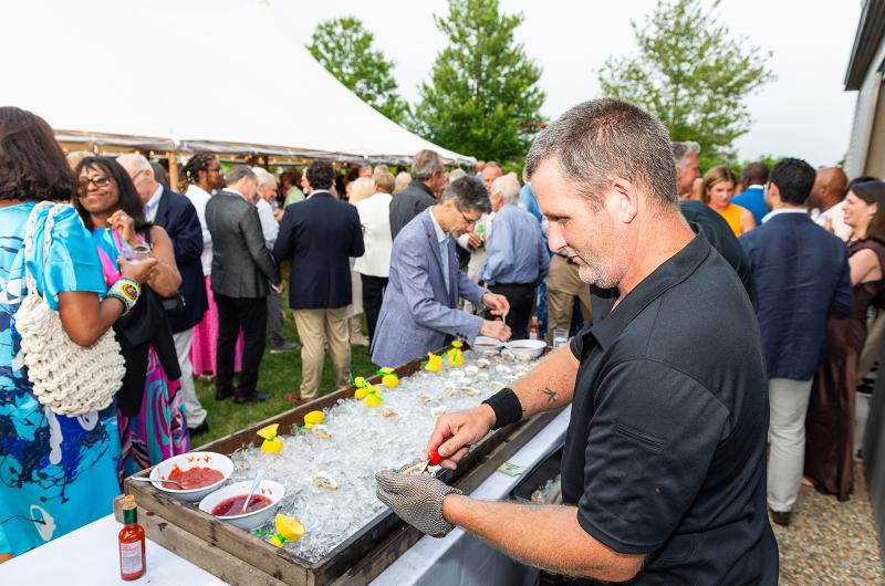 Guests enjoy the raw bar.