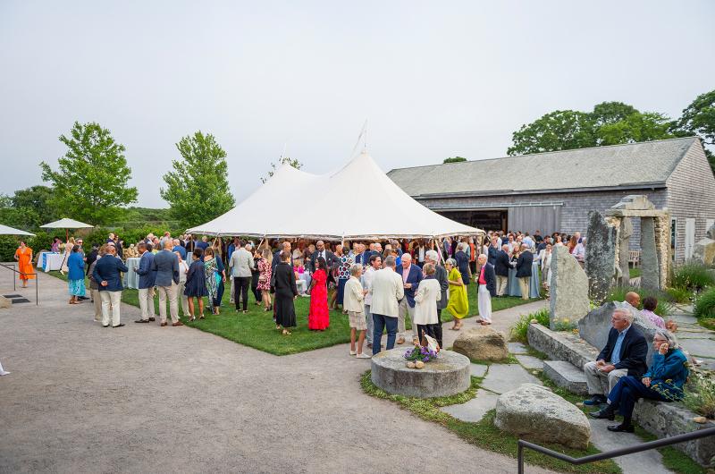 A silent auction is held in the courtyard before dinner.