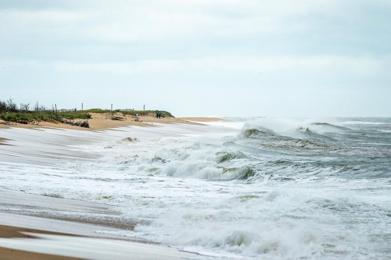 Storm surge pushes up on the beach.