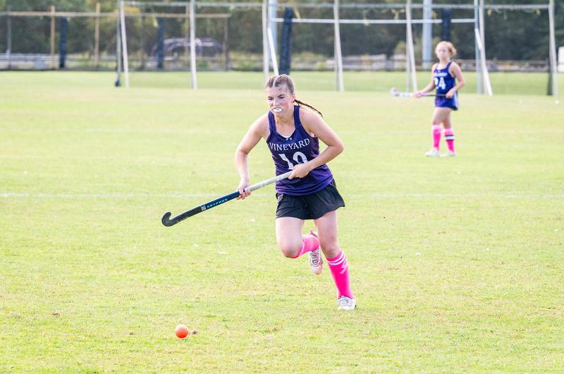 Vineyard player races ahead for the ball.