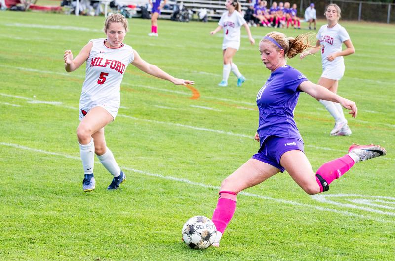 Eleanor Mone with a shot on goal.