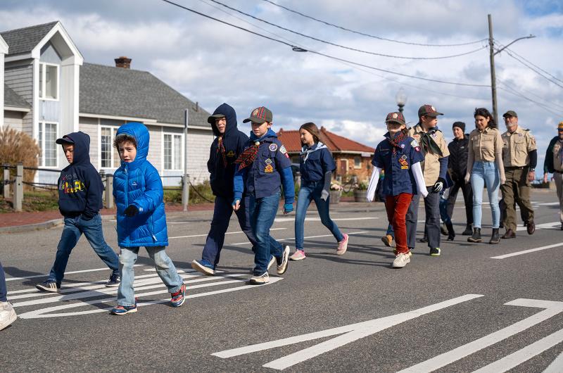 Young scouts parade as well.