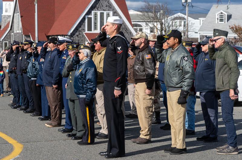 Veterans salute by the Oak Bluffs police station.