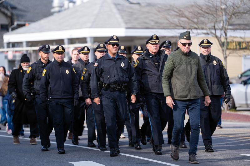 Island police officers join the parade.