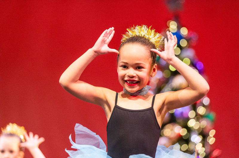 The smallest ballerinas are excited to perform.