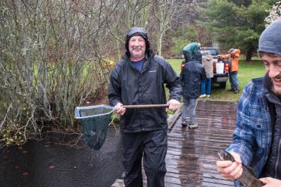 Stocking Duarte's Pond for kids' trout tournament