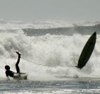 surfer wipes out