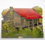 log cabin red roof stone chimney