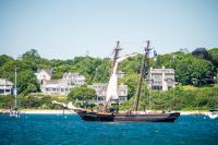 Finally, all sails are brought in.