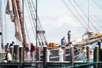 Crew members check on the ship.