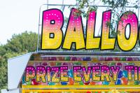 The Carnival buzzes and hums.