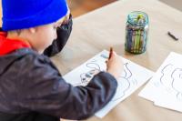 A young illustrator practices his Clifford art.