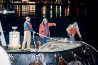 Thuban crew helping to pull whale into position, Billy Mabie (center).