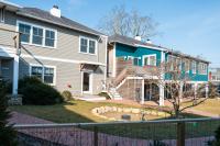 Private condo units have their own lawn area.