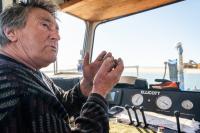 Donnie Benefit explains the inner workings of the dredge operation.