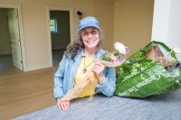 Pam Glavin left roses for the new tenants in the project which bears her late husband's name.