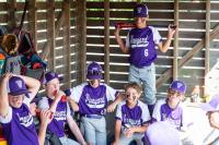 Little leaguers huddle up before the game.