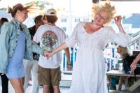 Rose Guerin (right) gets her dancing in before the wharf fills up.