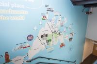 Educational maps lighten the hallways.