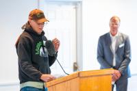 David Two Arrows Vanderhoop accepts a grant on behalf of Sassafrass Earth Education.