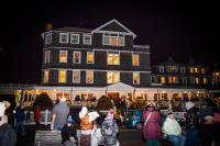 Revelers gather outside The Harborview Hotel on Friday night.