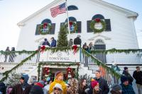 Parade viewers gather at Edgartown Town Hall.