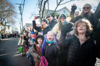 Some onlookers are quite excited to see Santa.