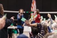 Voting with cards in West Tisbury.