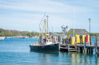 Little Lady tied up at the pier at the Tisbury Wharf Company.