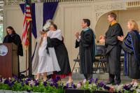 Sara Dingledy hugs a student.