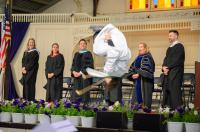 Pedro Alves performs a backflip after getting his diploma.