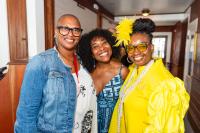 [l-r] Tre Smith, Quiana Higgins, and Arlene Kelly in line for the Gospel Brunch.