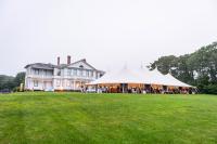 The annual fundraiser dinner takes place on the museum's front lawn.