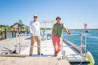 Sean McGowan and Isaac Taylor with the ferry tied up by The Galley.
