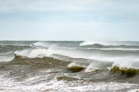 Breakers roll in out of the south.