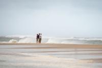 Dwarfed by the scale of the storm.