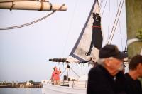 A black dog sail in unfurled on the Alabama.