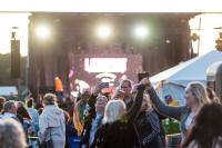 Crowds gather as the evening goes on.